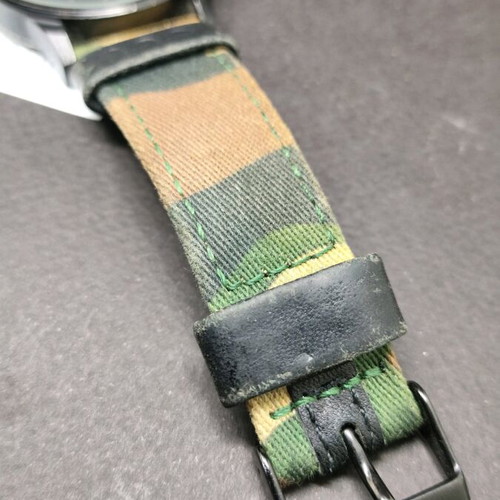 Komono watch used with leather and fabric military strap