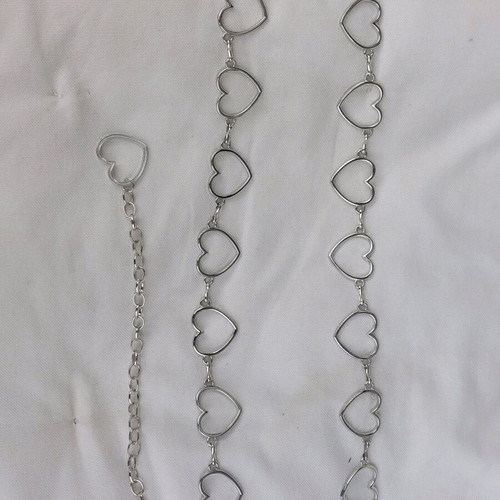 Silver metal women's belt like new, adjustable size