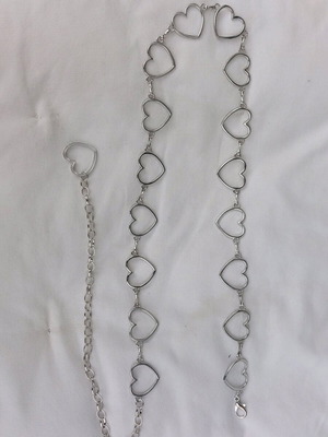 Silver metal women's belt like new, adjustable size
