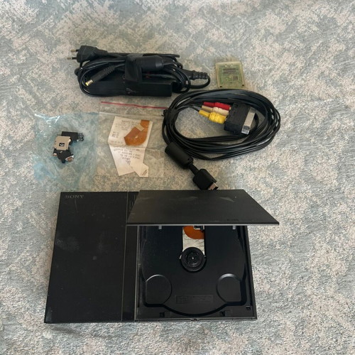 PlayStation 2 used for spare parts with controller and chip