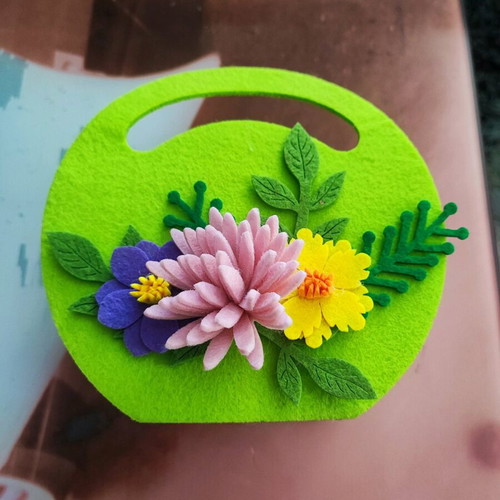 Felt basket like new with stamps on the inner side