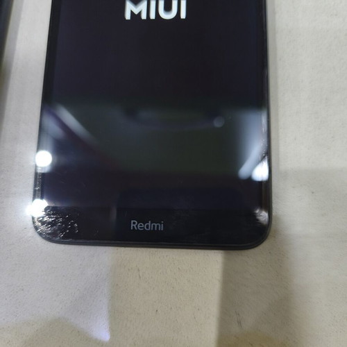Xiaomi Redmi 7A smartphone with case