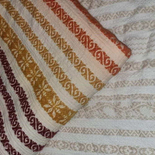 Handwoven blanket on loom like new with traditional patterns