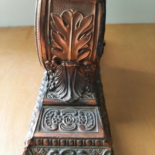 Copper German wind-up clock used with cathedral motif