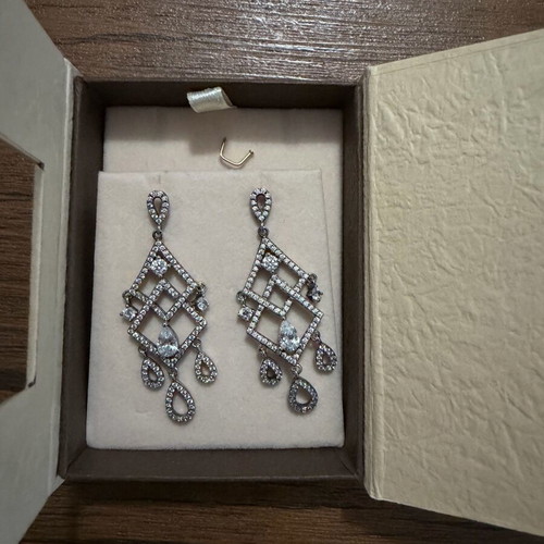 Women's earrings new silver unworn