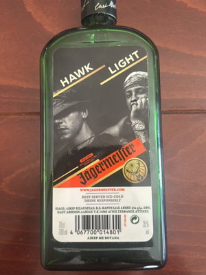 Jagermeister collectible bottle used, empty with Light & Hawk label