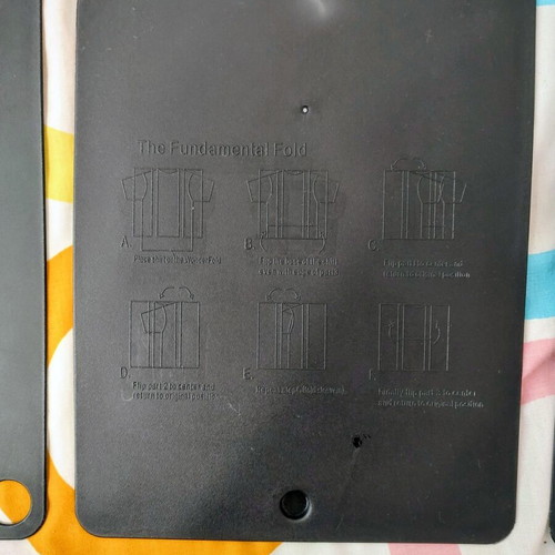 Clothes folding board like new, durable plastic
