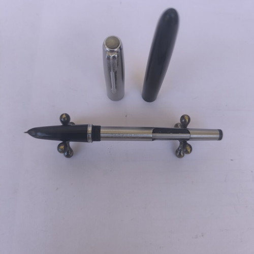 Parker 51 pen used with stainless steel cap and black resin body