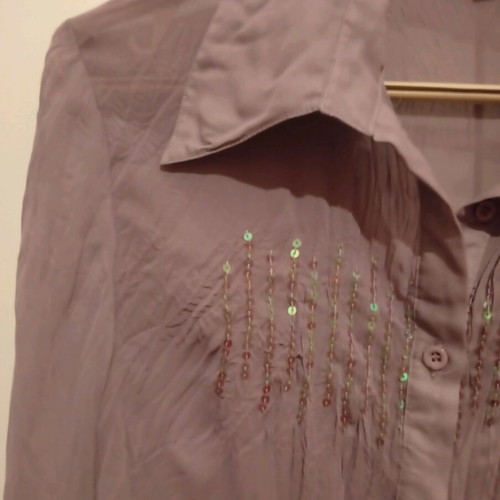 Shirt new size medium with sequins and impressive design
