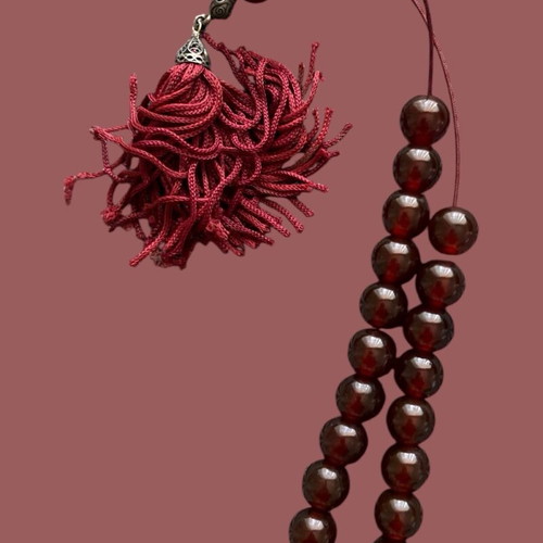 Worry beads in deep red color like new