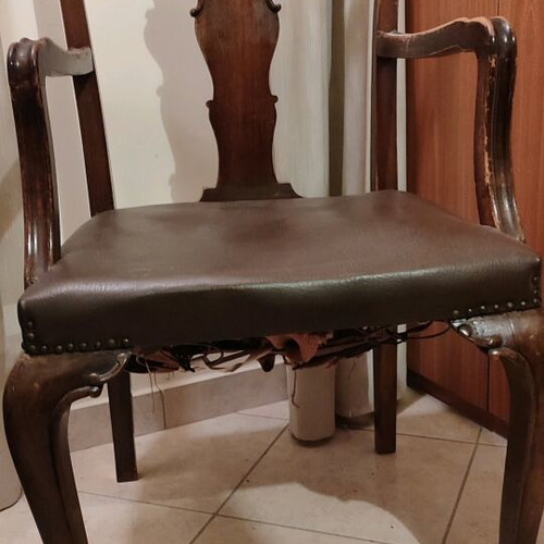 Antique armchair used, wooden with leather seat