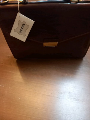 Leather briefcase new, tan color, missing shoulder strap