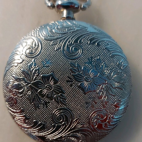 Charisma pocket watch like new with battery silver