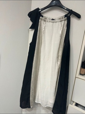 Bsb dress like new with adjustable neck ribbon, black and white