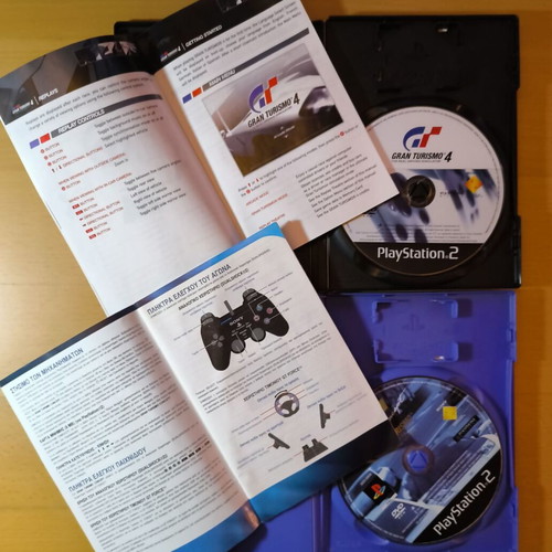 Gran Turismo bundle used for PlayStation 2 with GT4 and GT Concept 2002 Tokyo-Geneva