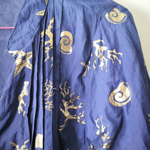 Women's blue shirt with gold designs, 3/4 sleeves, adjustable