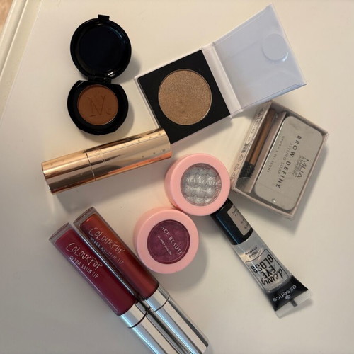 Various cosmetics like new, Colourpop liquid lipsticks and eyeshadows