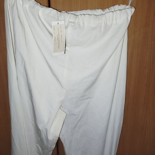 Italian white pants M new with small tears