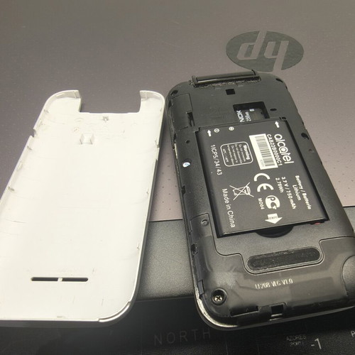 Alcatel mobile phone, silver, memory card slot