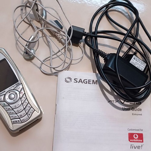 SAGEM My V-56 used with charger and hands free headset