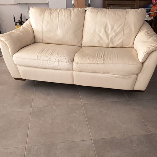 Ikea leather three-seater sofa used with some wear