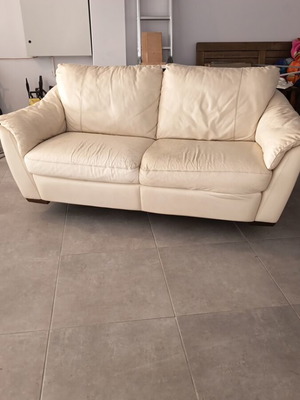 Ikea leather three-seater sofa used with some wear