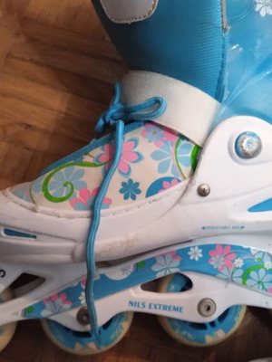 Skate rolls NILS Extreme ABEC5 adjustable size 34-37 like new