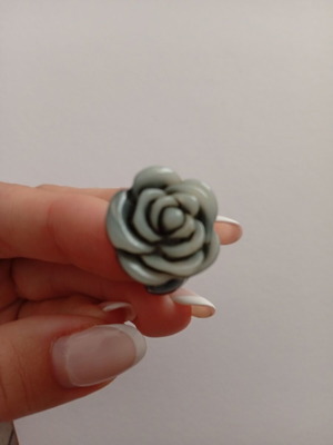 Ring like new black plastic rose shape