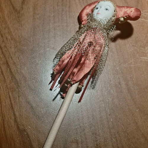 Decorative Harlequin figure on stick like new, red costume