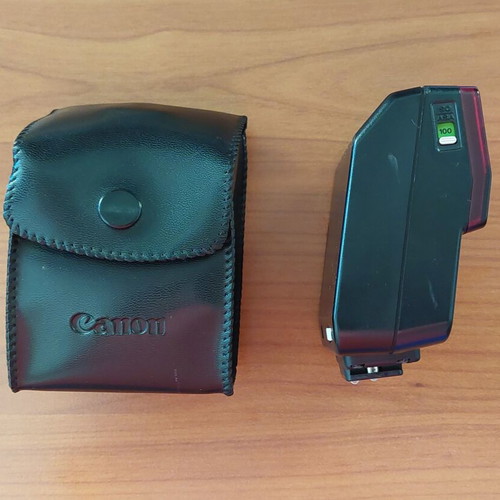 Canon T70 film camera with 2 lenses, flash and case like new