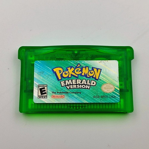 Pokemon Emerald Version for Game Boy Advance used with manual and poster