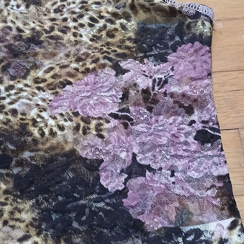 Batic sleeveless floral women's top with mixed animal print, like new, size M