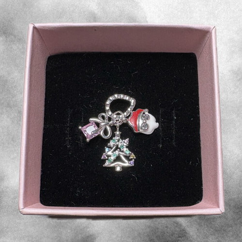 Pandora Holiday Cheer Charm like new, white and multicolor