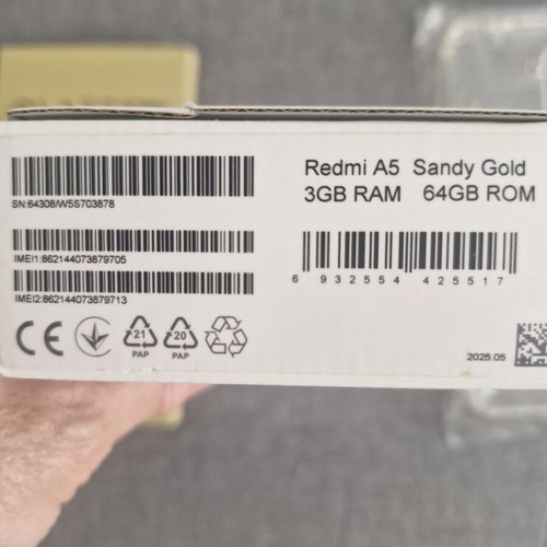 Redmi A5 64GB Sandy Gold smartphone with bonus glass protectors and case