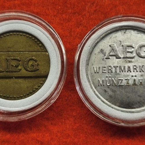 Lot of two old AEG tokens