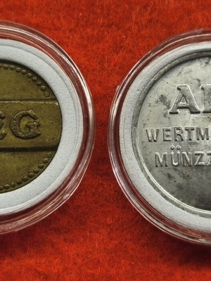 Lot of two old AEG tokens