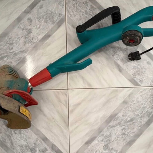 Electric grass trimmer used