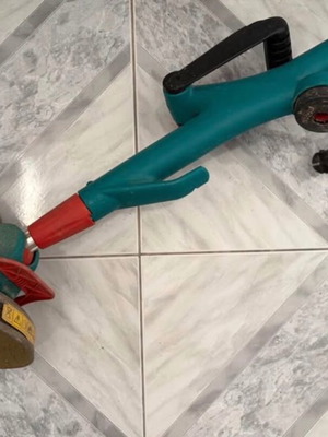 Electric grass trimmer used