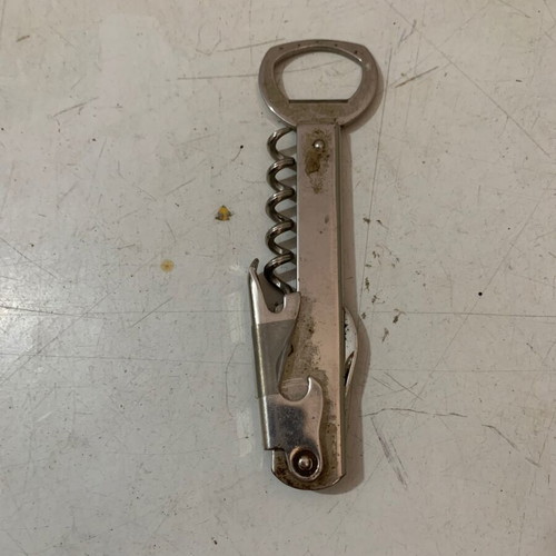 Vintage metal corkscrew bottle opener used