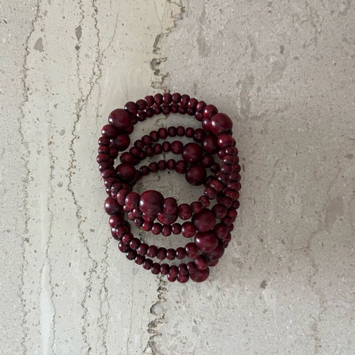 Wooden spiral bracelet like new with adjustable diameter and brown-red beads