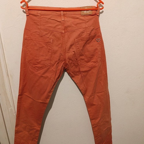Please Italian orange jeans size M used