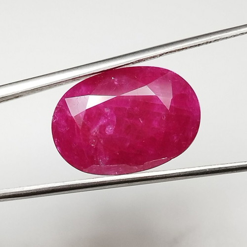 Ruby 10.54 carat hot pinkish red from Mozambique new