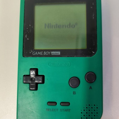 Game Boy Pocket Green console used with Test Drive 6 game