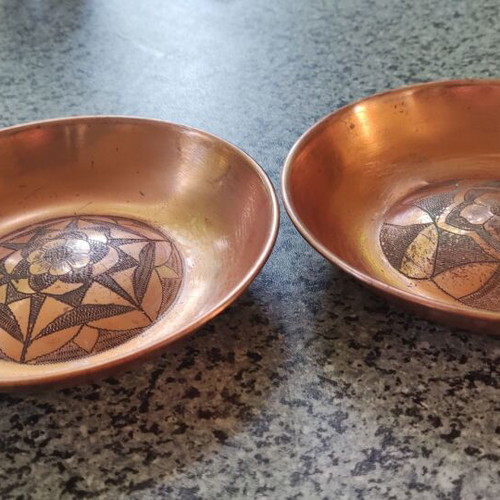 Brass decorative plates set with handmade carving used