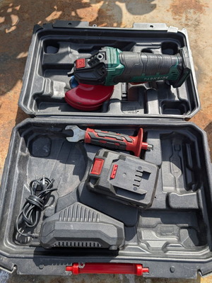 Parkside battery angle grinder used with charger and key