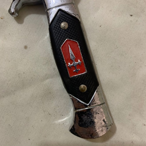Decorative knife used with sheath and cracked aluminum handle