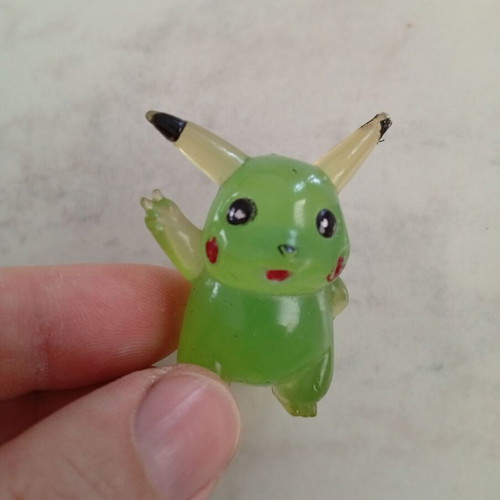 Vintage Pikachu figure miniature, clear green bootleg
