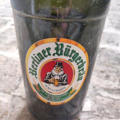 Large used collectible Berliner Burgerbrau beer bottle