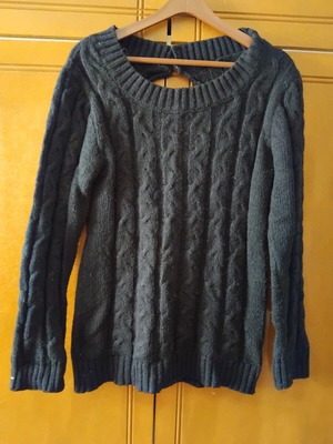 Black knitted sweater with cable design and back opening used, size L