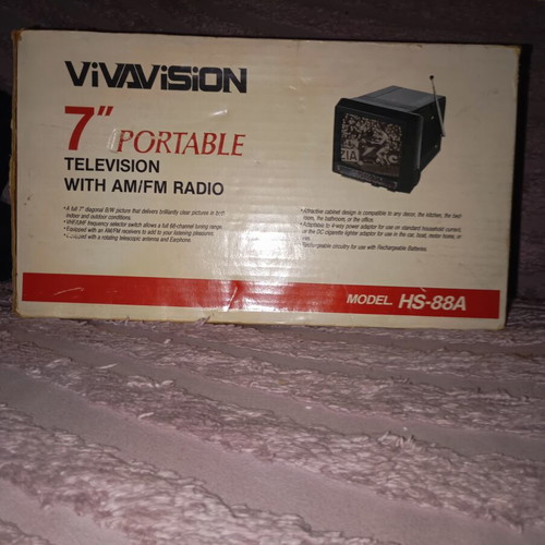 Vintage portable black and white television with radio like new